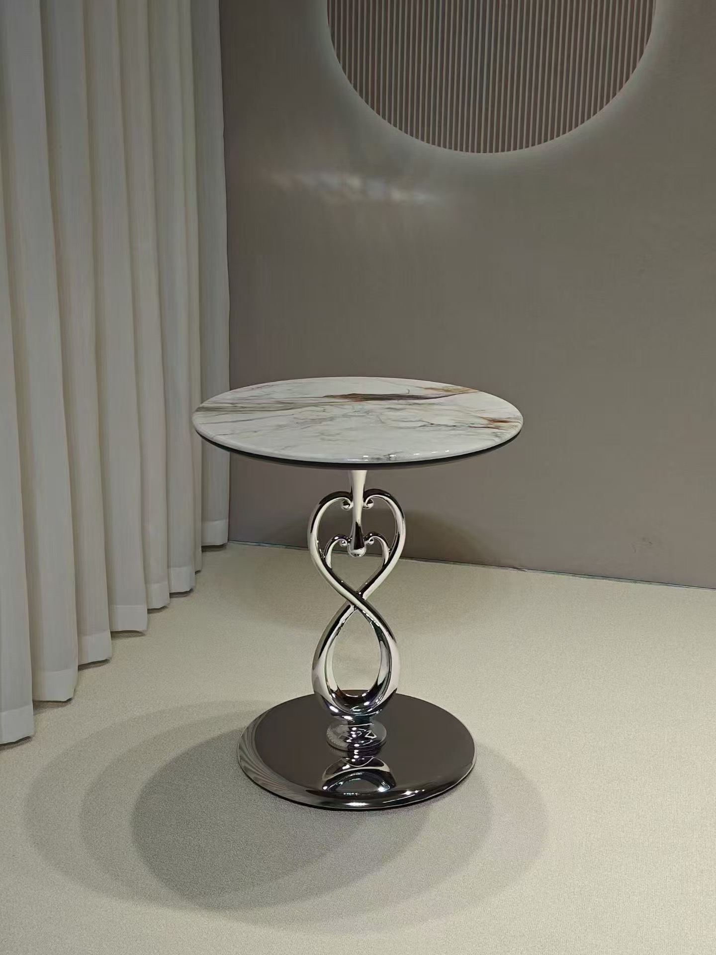 Double love twisted stainless steel edge table